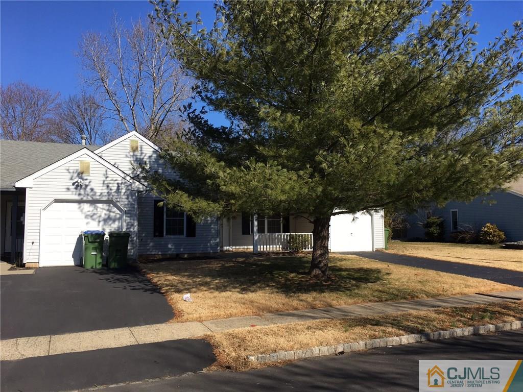 22 Woodbury Road Edison, NJ 08820 - Photo 3 of 25 a view of a house with a yard