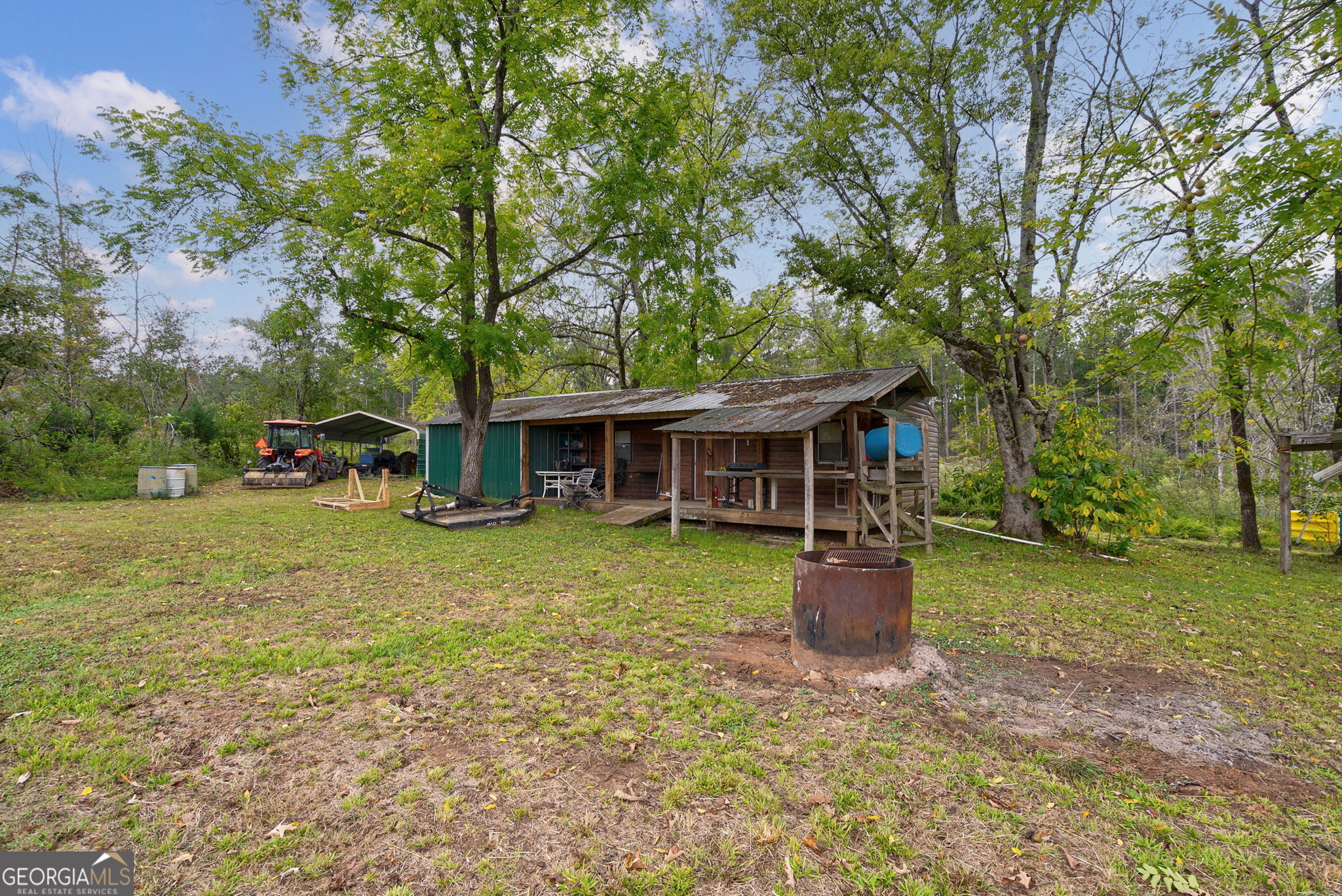 1 New Hope Vesta Road Carlton, GA 30627 - Photo 19 of 36 a front view of a house with a yard and trees