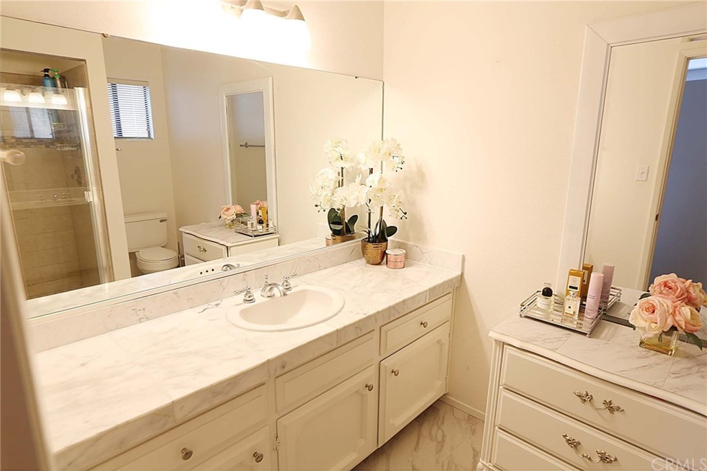 3287 Ocean Boulevard Cayucos, CA 93430 - Photo 6 of 17 a bathroom with a sink and a mirror