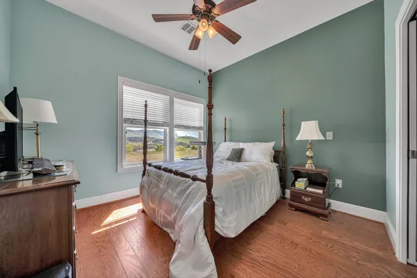 a view of a bedroom with washer and dryer