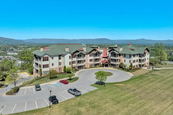 an aerial view of residential house with outdoor space
