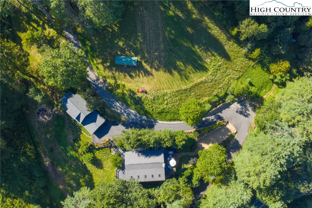 165 All Hallows Road Boone, NC 28607 - Photo 5 of 50 an aerial view of residential house with yard and swimming pool