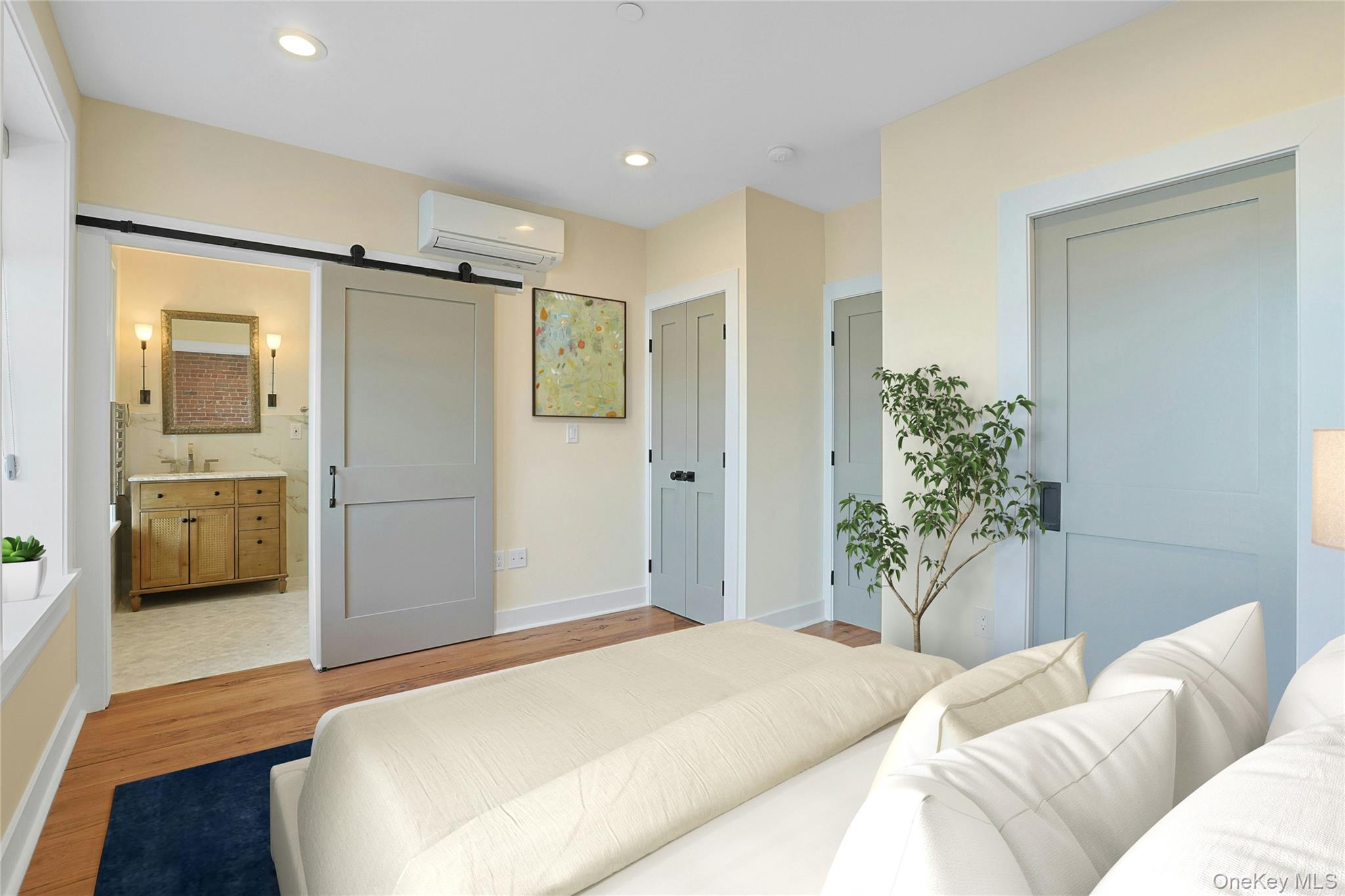 19 Main Street, Unit 2 Tarrytown, NY 10591 - Photo 14 of 24 a bedroom with a bed and a couch