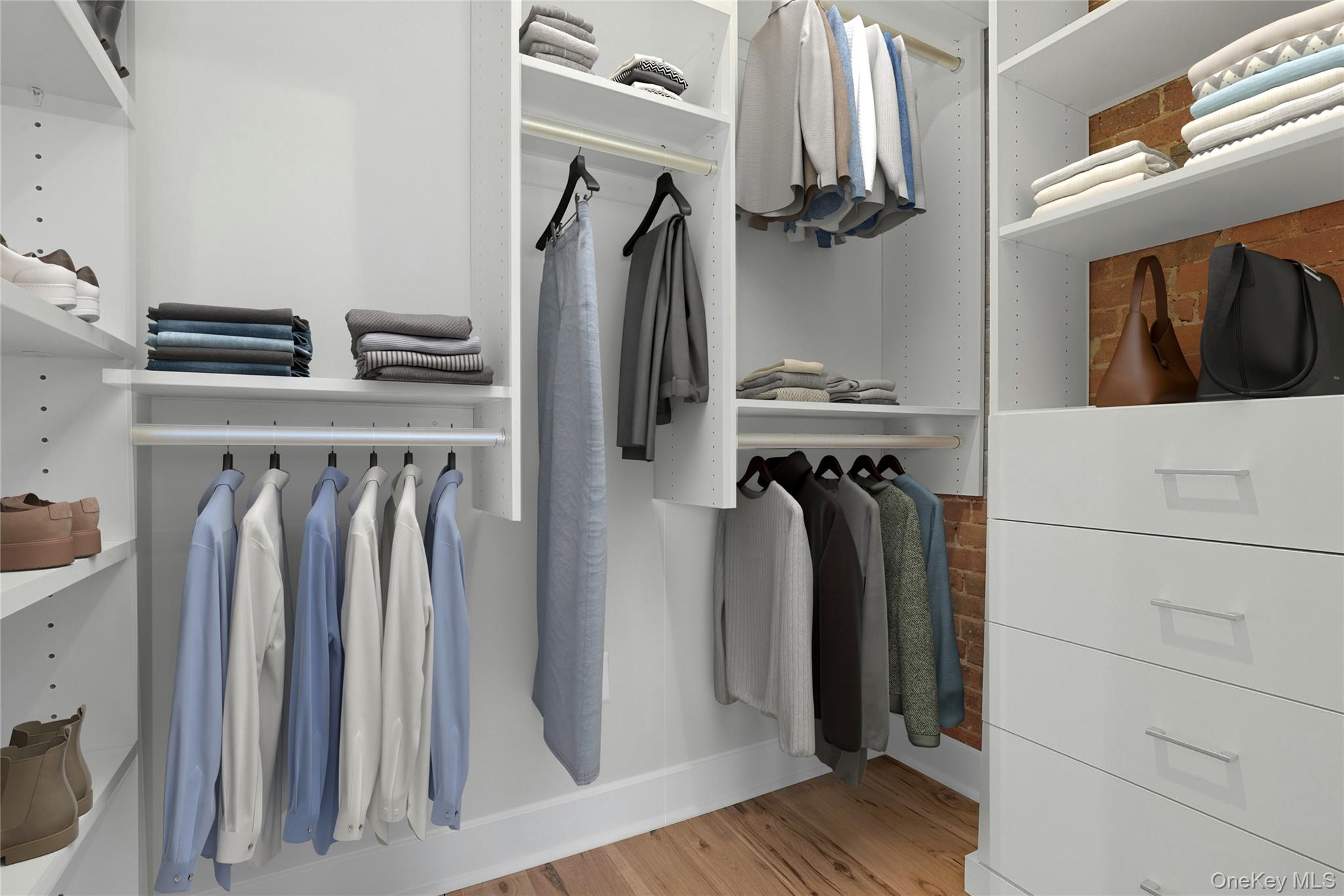 19 Main Street, Unit 2 Tarrytown, NY 10591 - Photo 16 of 24 a view of walk in closet with clothes and shoes
