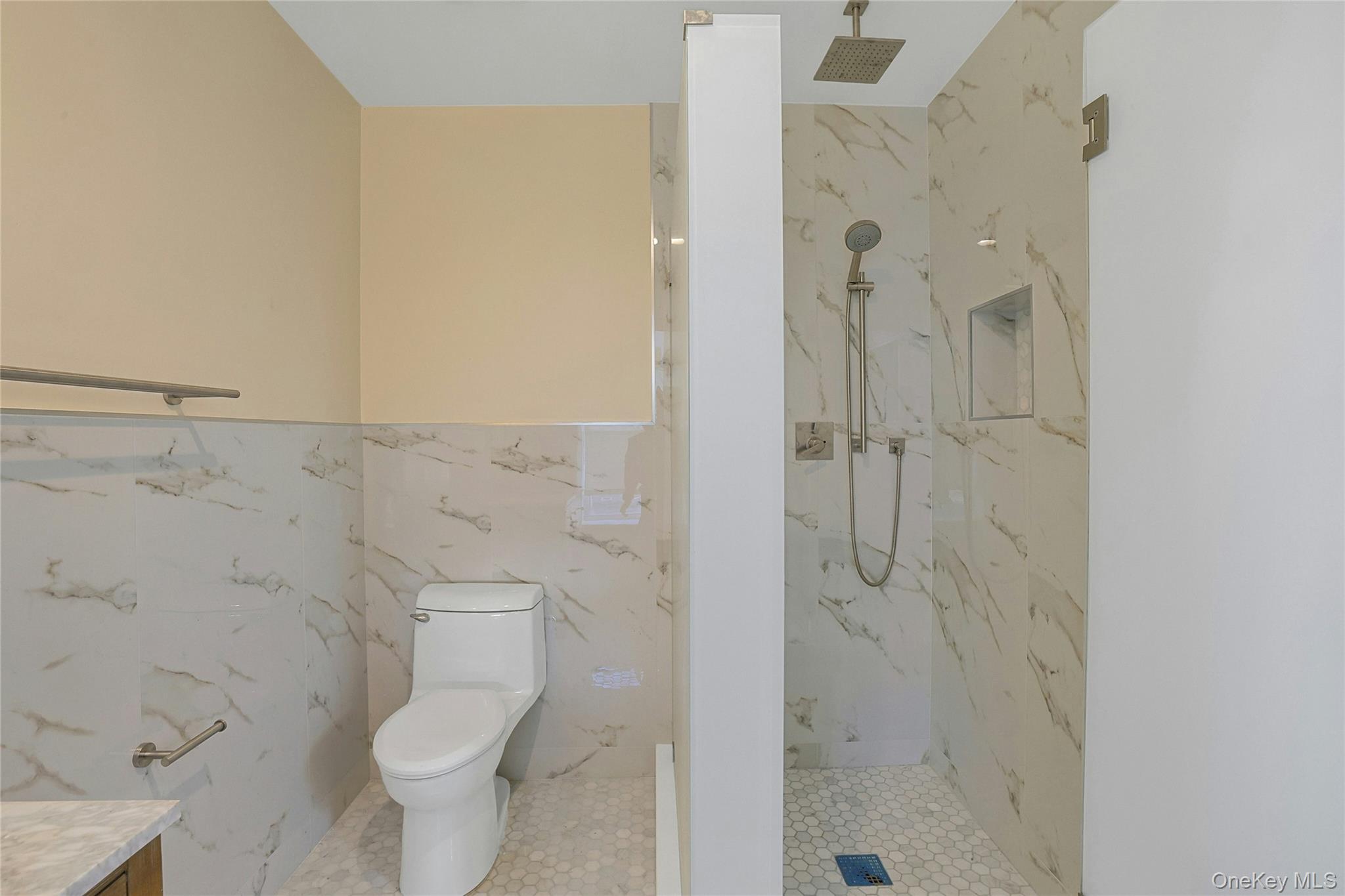 19 Main Street, Unit 2 Tarrytown, NY 10591 - Photo 19 of 24 a bathroom with a toilet and a shower
