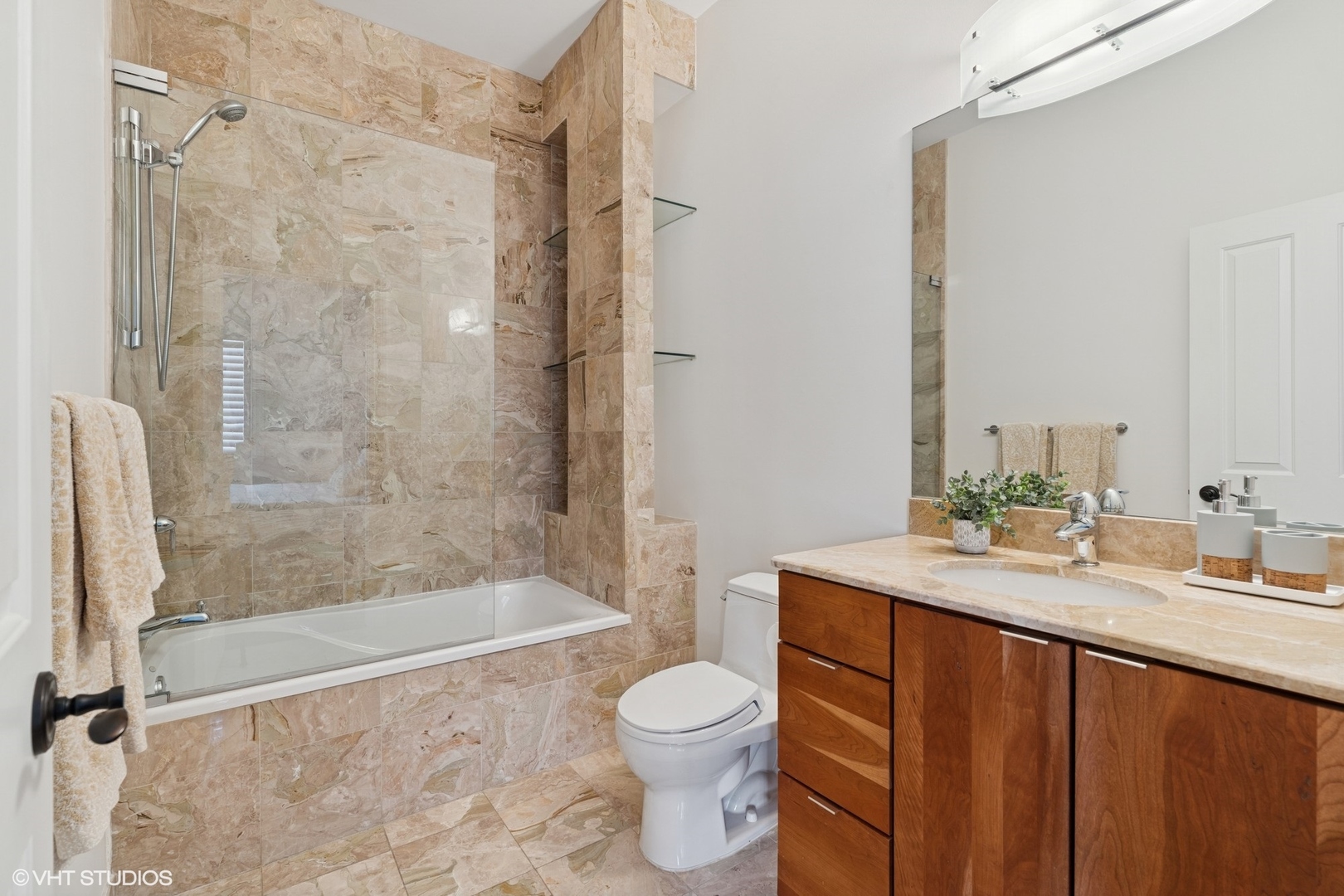 952 North Racine Avenue Chicago, IL 60642 - Photo 15 of 24 a bathroom with a sink a toilet and shower