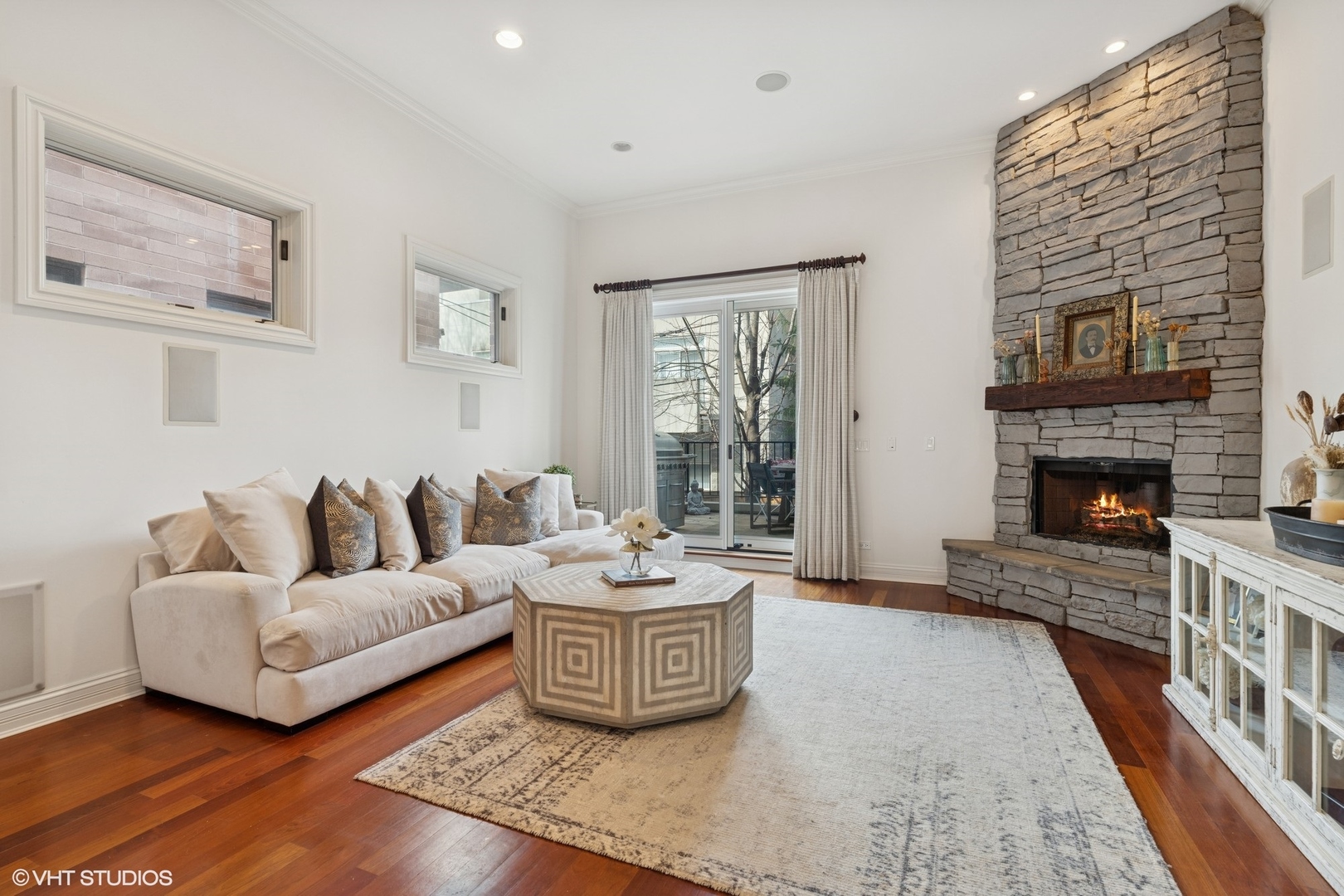 952 North Racine Avenue Chicago, IL 60642 - Photo 2 of 24 a living room with furniture and a fireplace