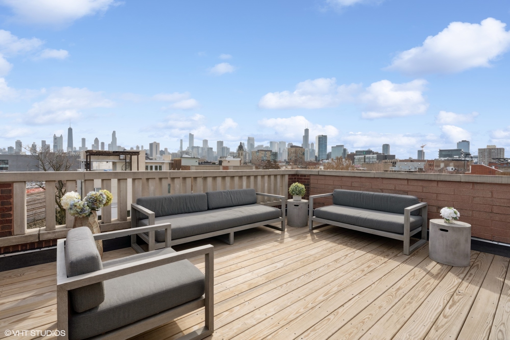 952 North Racine Avenue Chicago, IL 60642 - Photo 22 of 24 a view of a roof deck with couches