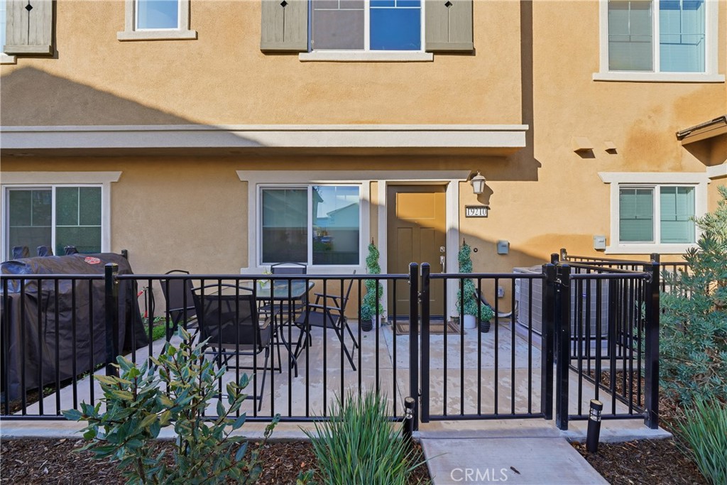 19210 Ash Grv Street Riverside, CA 92507 - Photo 1 of 38 a view of a house with a small yard and deck
