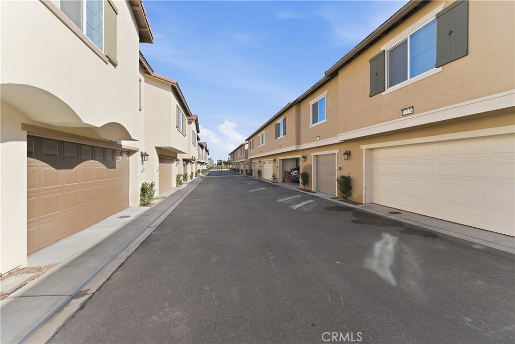 19210 Ash Grv Street Riverside, CA 92507 - Photo 33 of 38 a view of a street with the road