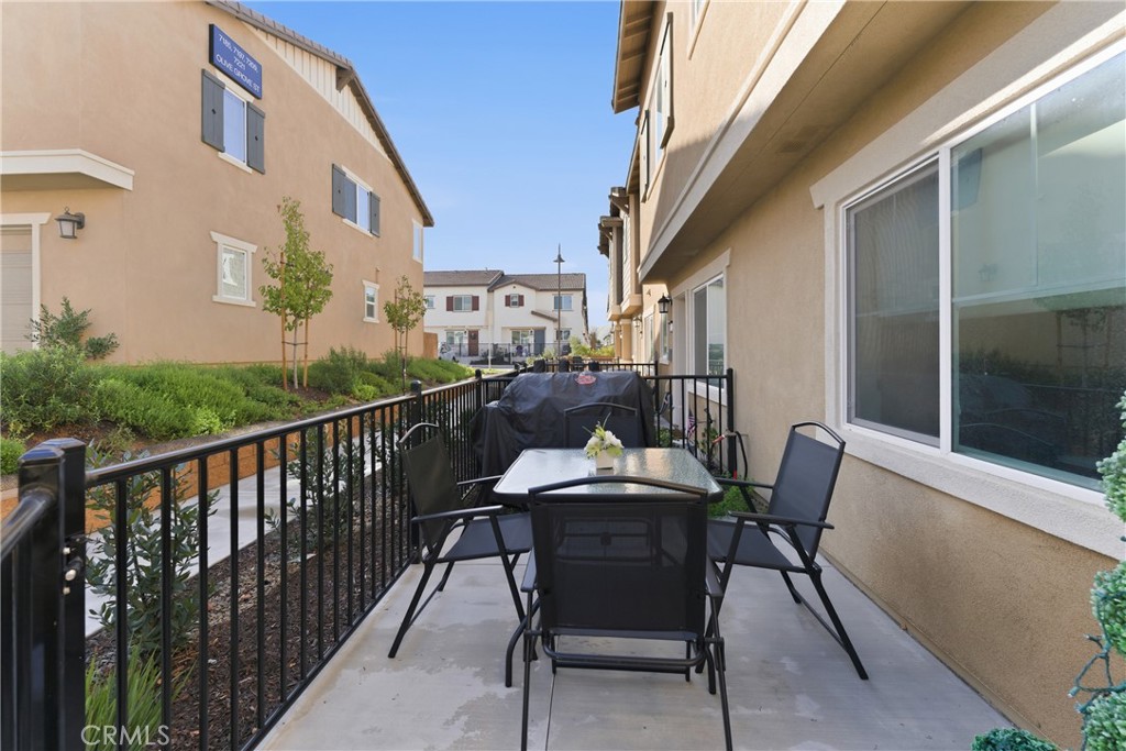 19210 Ash Grv Street Riverside, CA 92507 - Photo 4 of 38 a view of a balcony with furniture