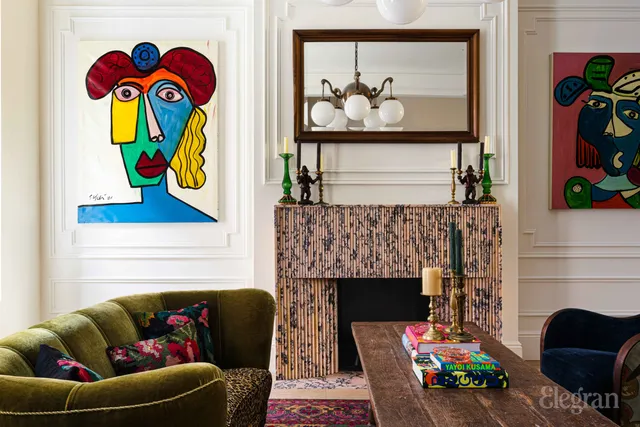 a living room with a couch and a fireplace