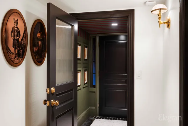 a view of balcony with chairs and potted plants