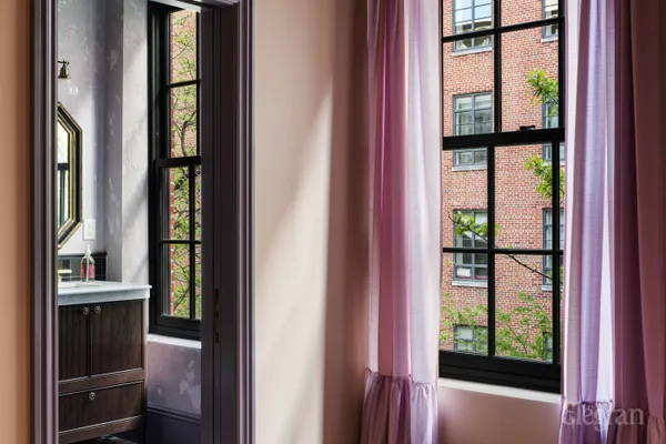 a view of a patio with a table and chairs