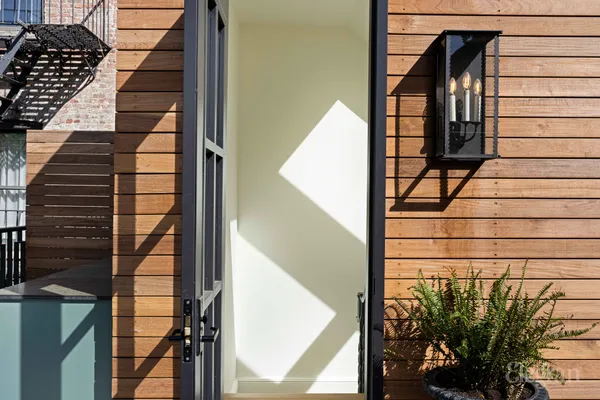 a view of a street with sitting area