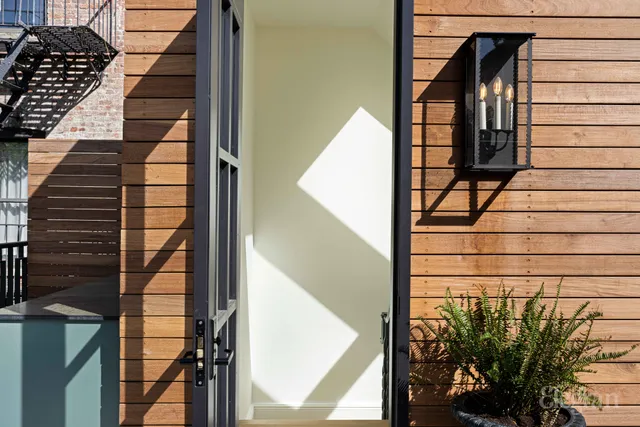 a view of a street with sitting area