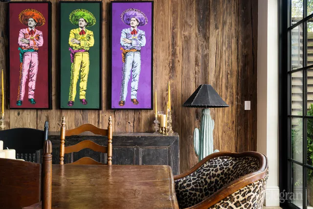 a dining room with furniture window and wooden floor