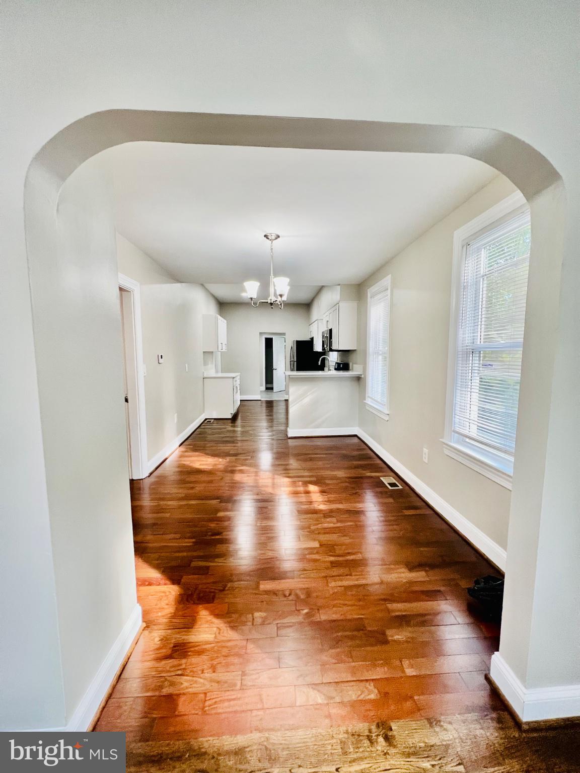 5709 Dade Street Capitol Heights, MD 20743 - Photo 11 of 30 a view of a kitchen with a sink and cabinets