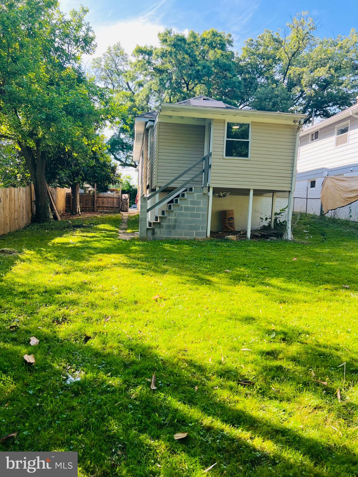 5709 Dade Street Capitol Heights, MD 20743 - Photo 16 of 30 a view of a house with a yard balcony and a tree
