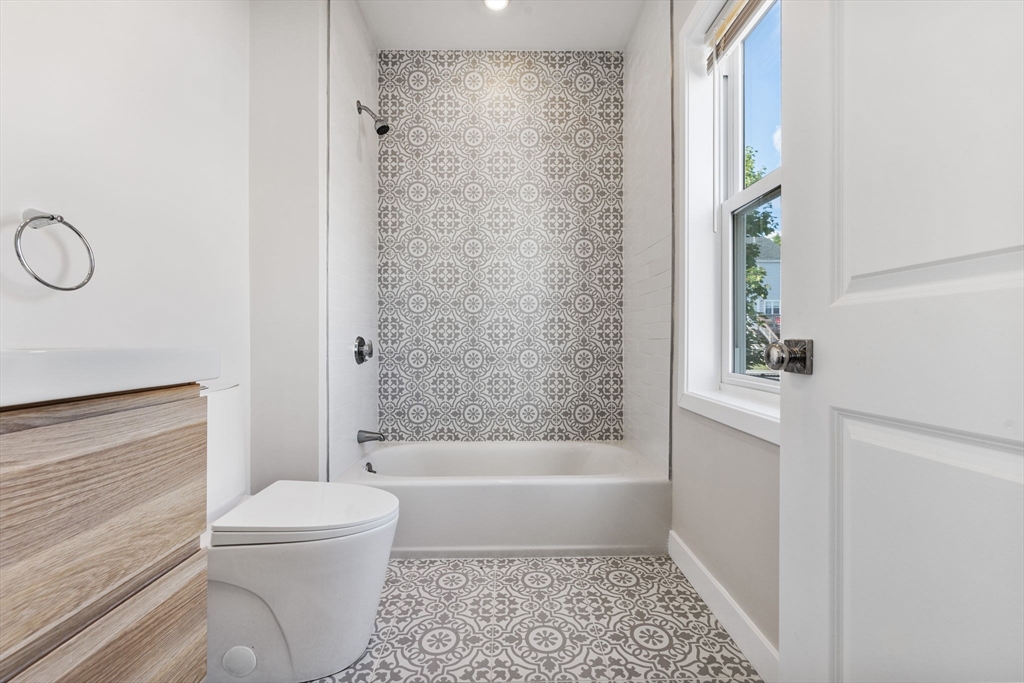 10 Ruthven Park, Unit 2 Boston, MA 02121 - Photo 21 of 25 a bathroom with a bathtub and a shower