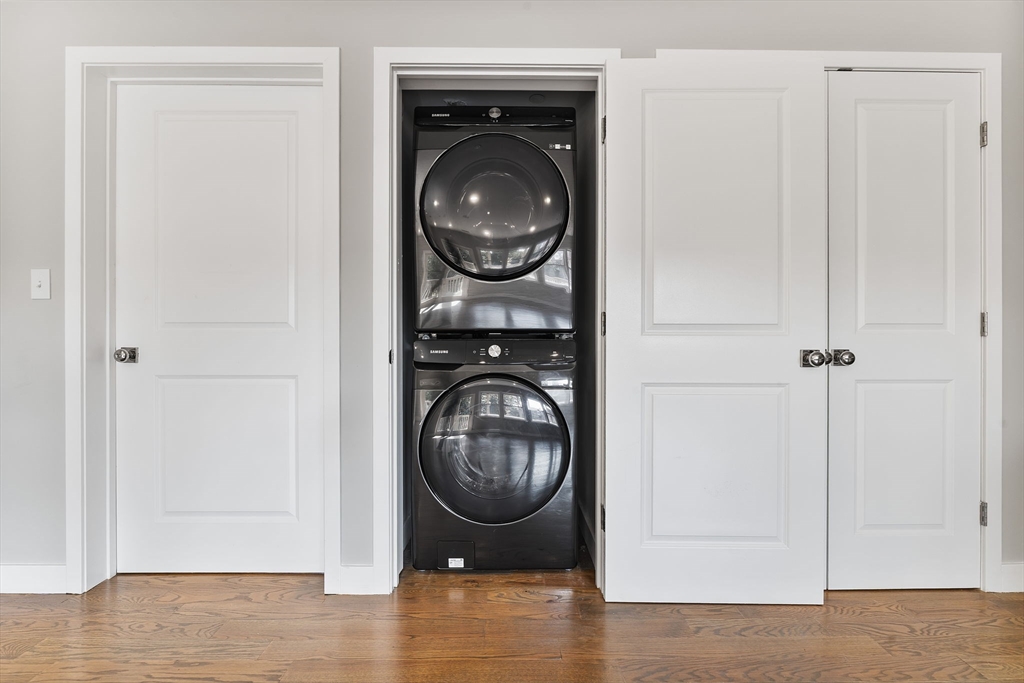10 Ruthven Park, Unit 2 Boston, MA 02121 - Photo 24 of 25 a view of a storage & utility room with washer and dryer