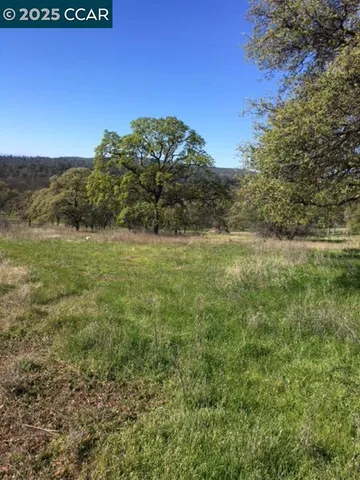 a view of outdoor space with mountain view