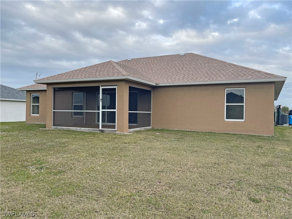 2804 Nelson Road North Cape Coral, FL 33993 - Photo 16 of 16 a house with yard