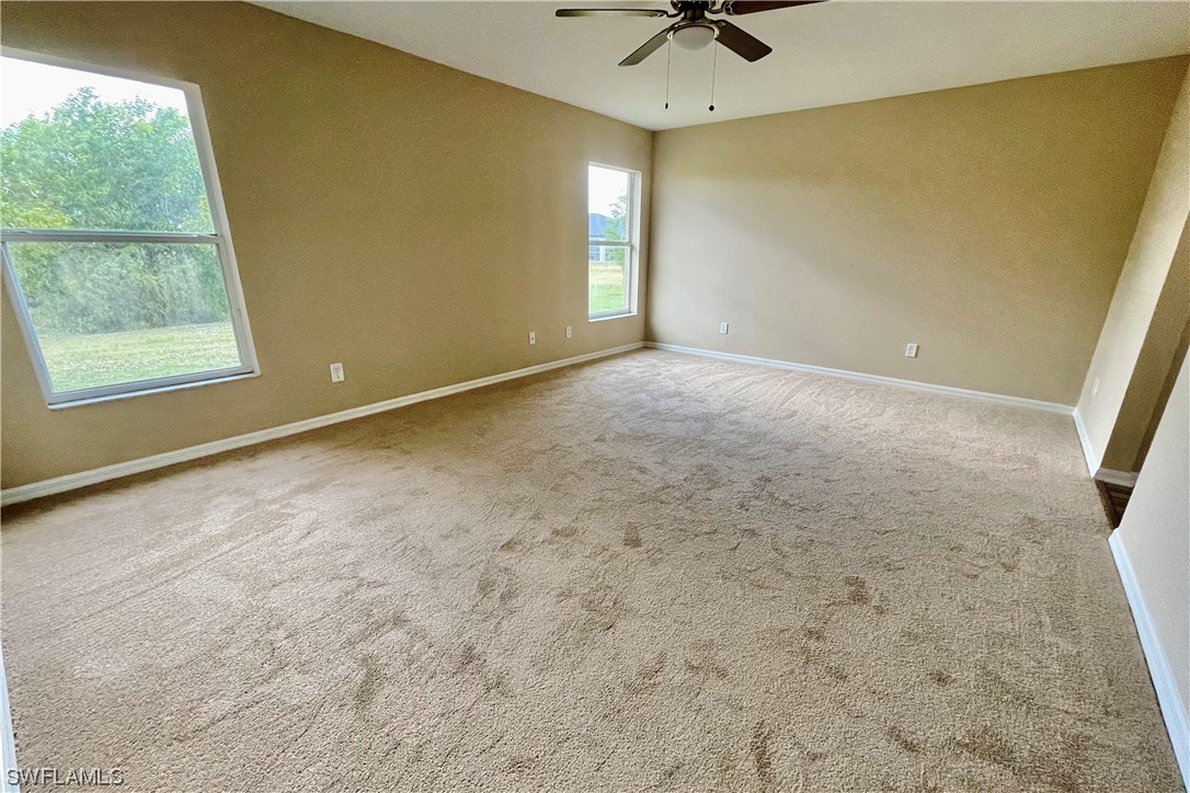 2804 Nelson Road North Cape Coral, FL 33993 - Photo 9 of 16 an empty room with a window