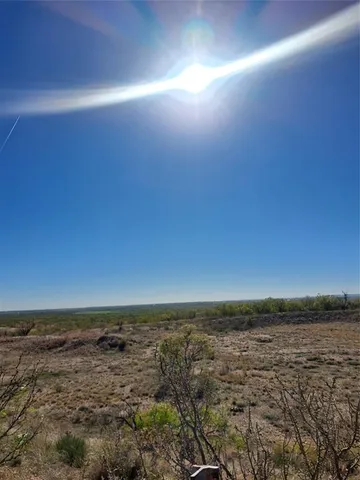 a view of a lake with mountain