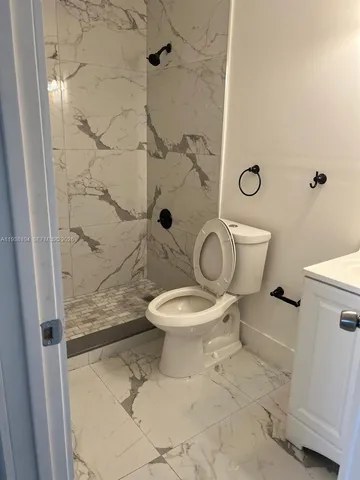 an empty room with a empty space and windows