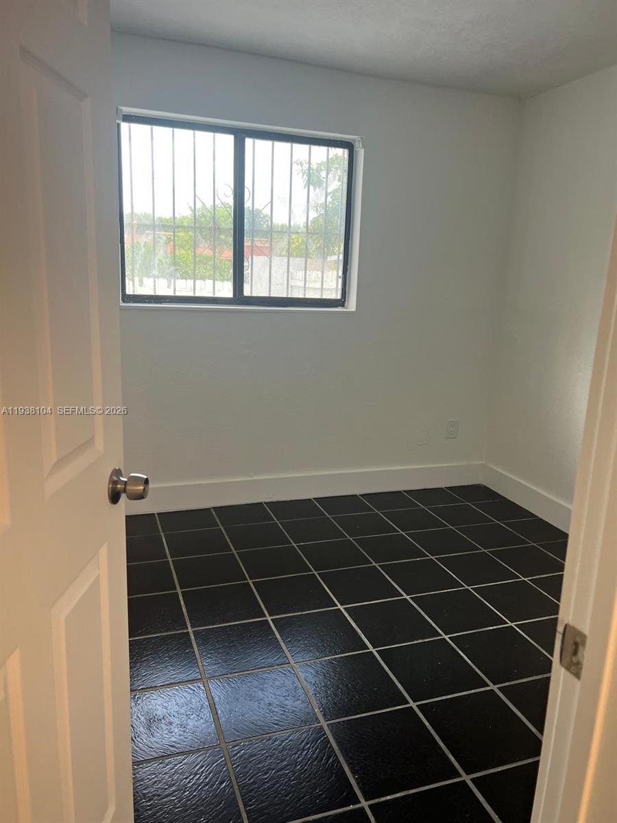 14013 Southwest 281st Terrace Homestead, FL 33033 - Photo 8 of 10 a close up of a shower