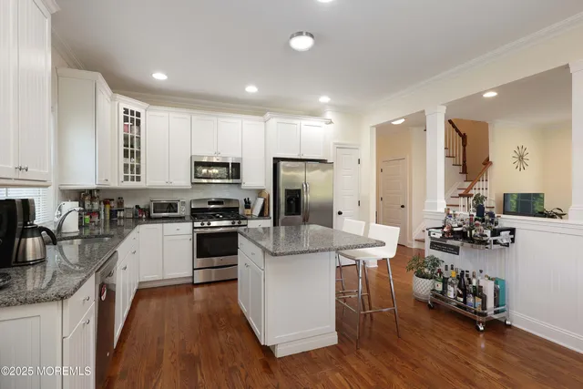 a kitchen with counter space cabinets and appliances