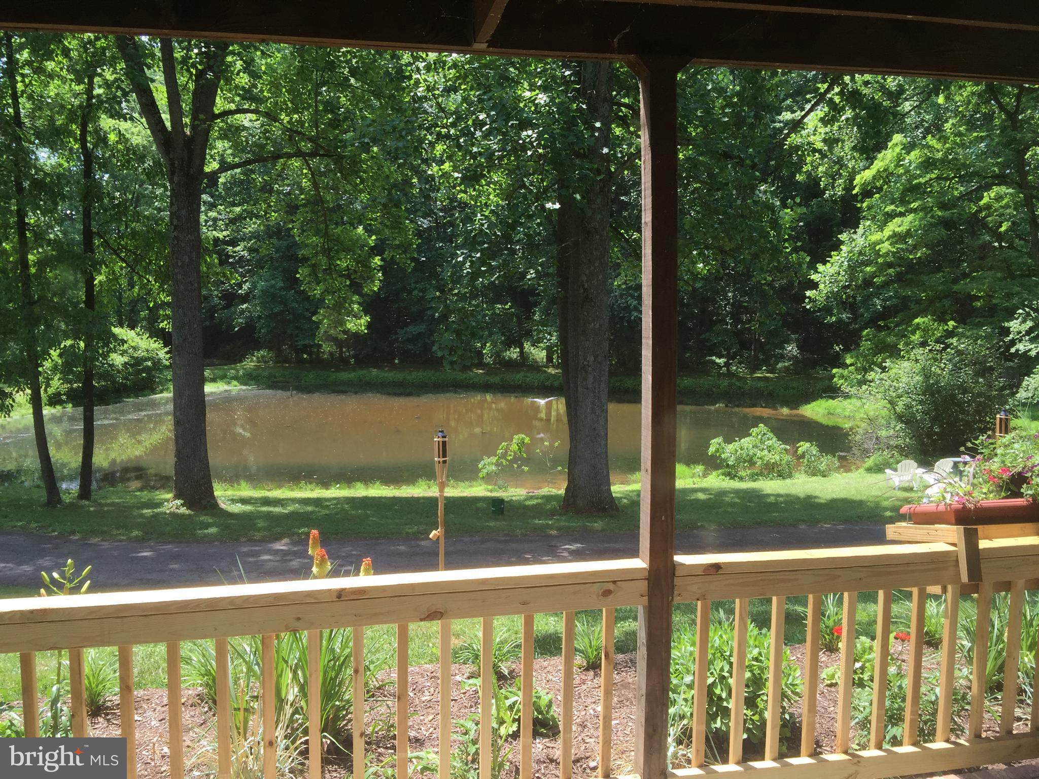 6009 Mt Phillip Road Frederick, MD 21703 - Photo 2 of 22 Exterior (Front FRONT PORCH OVERLOOKING POND