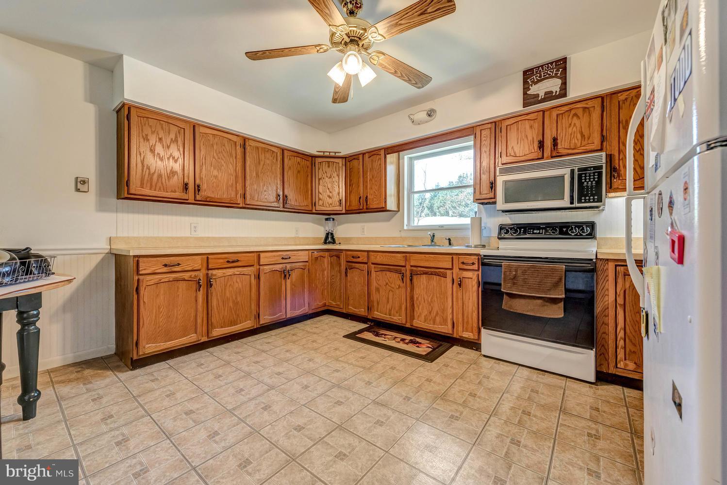 6009 Mt Phillip Road Frederick, MD 21703 - Photo 19 of 22 Kitchen OF SECOND LEVEL APARTMENT