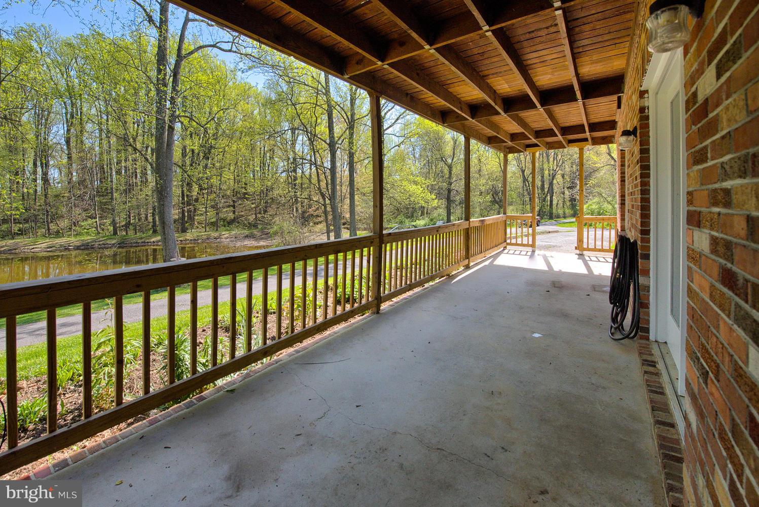 6009 Mt Phillip Road Frederick, MD 21703 - Photo 5 of 22 Exterior (Front) FRONT DECK..GROUND LEVEL APT.