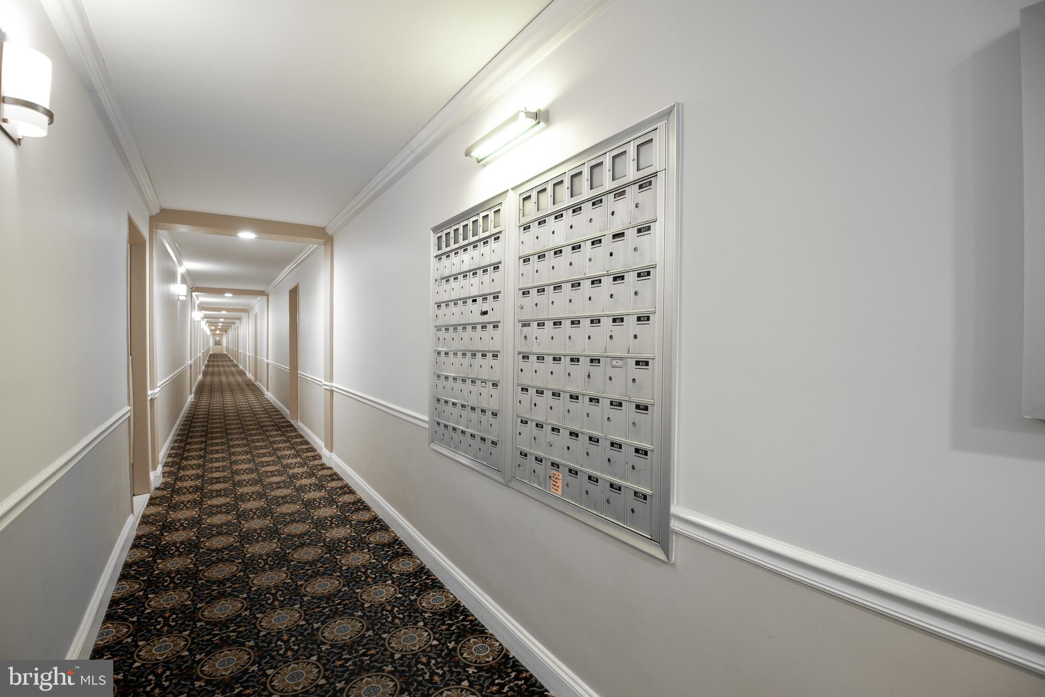 2501 Calvert Street Northwest, Unit 811 Washington, DC 20008 - Photo 14 of 28 a view of a hallway with windows