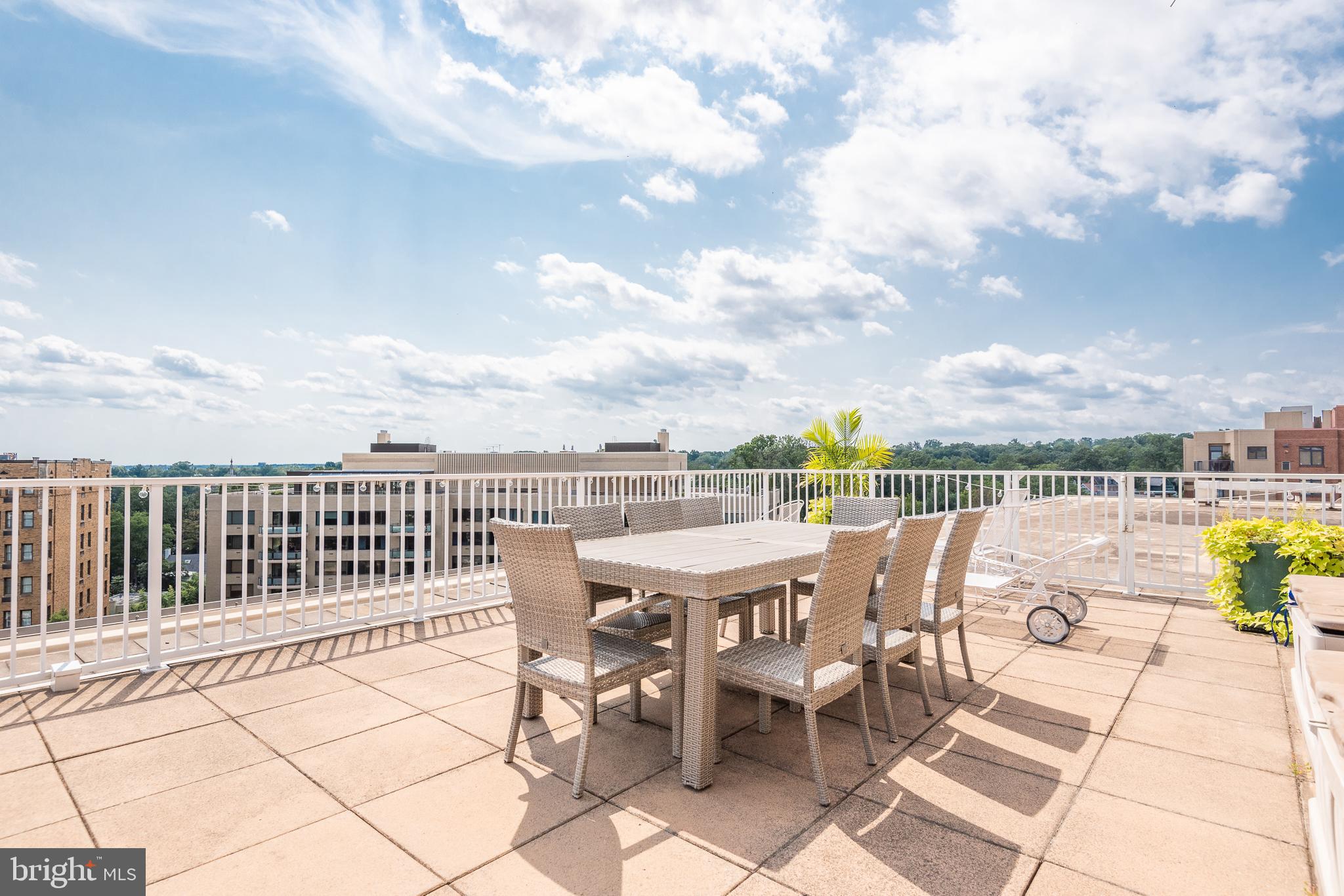2501 Calvert Street Northwest, Unit 811 Washington, DC 20008 - Photo 16 of 28 a view of a terrace with furniture