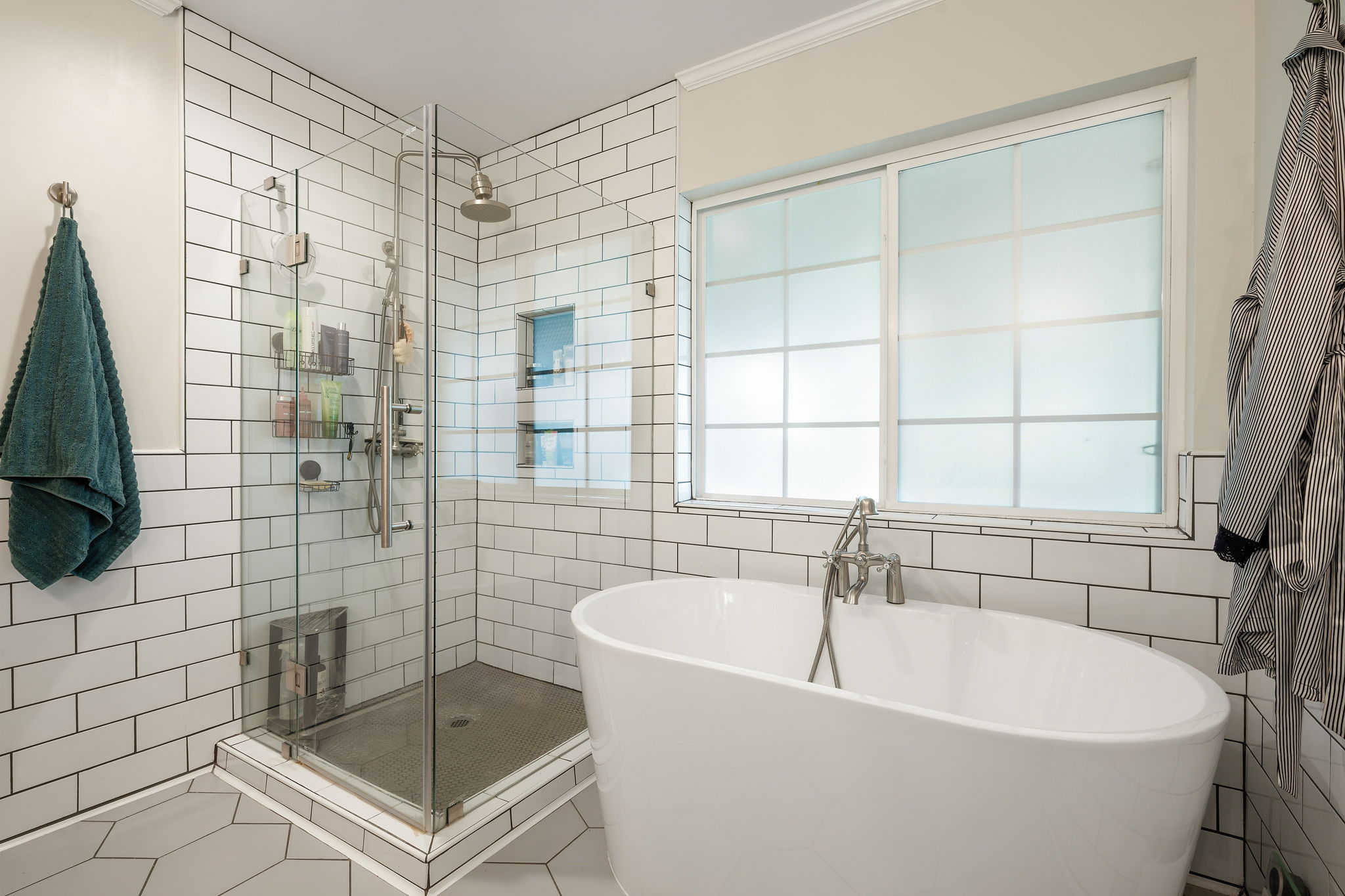 705 Canyon Bend Road Pflugerville, TX 78660 - Photo 13 of 23 a white bath tub sitting next to a shower