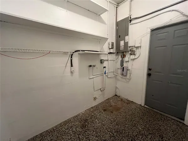 a view of a room with racks on the wall