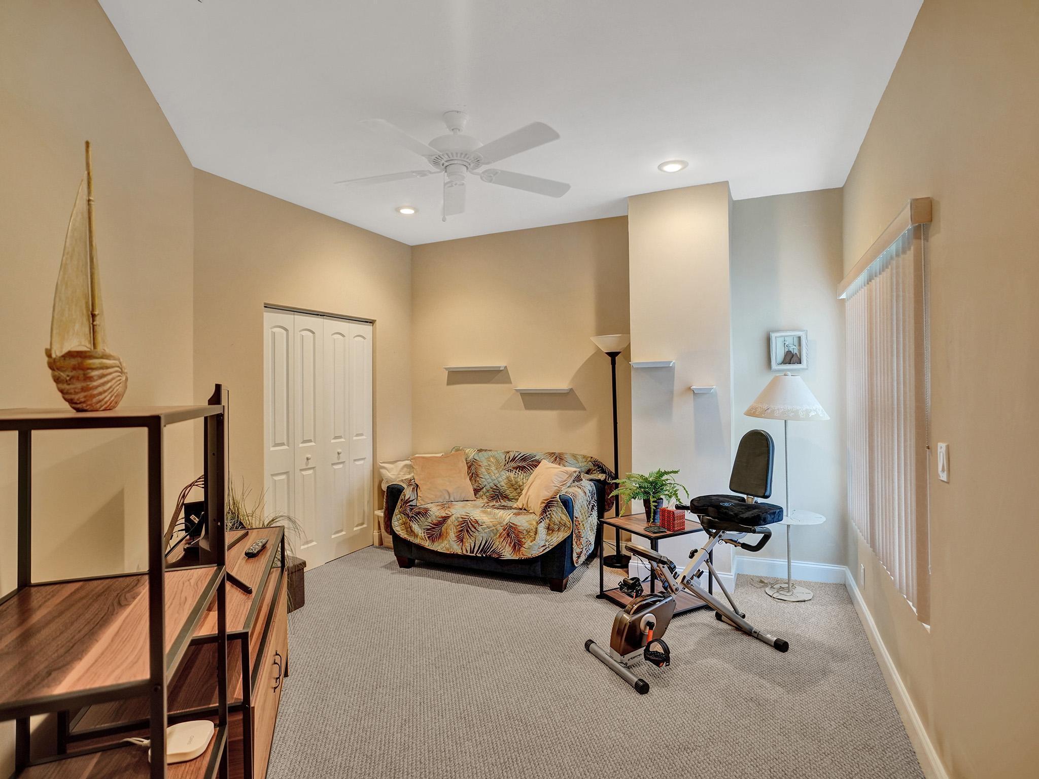 17288 Hampton Boulevard Boca Raton, FL 33496 - Photo 17 of 36 a view of a workspace with furniture and a window