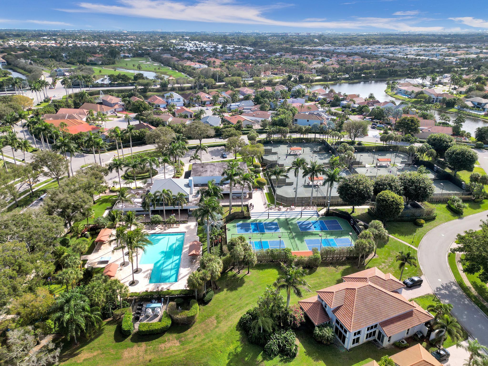 17288 Hampton Boulevard Boca Raton, FL 33496 - Photo 24 of 36 an aerial view of residential houses with outdoor space and trees