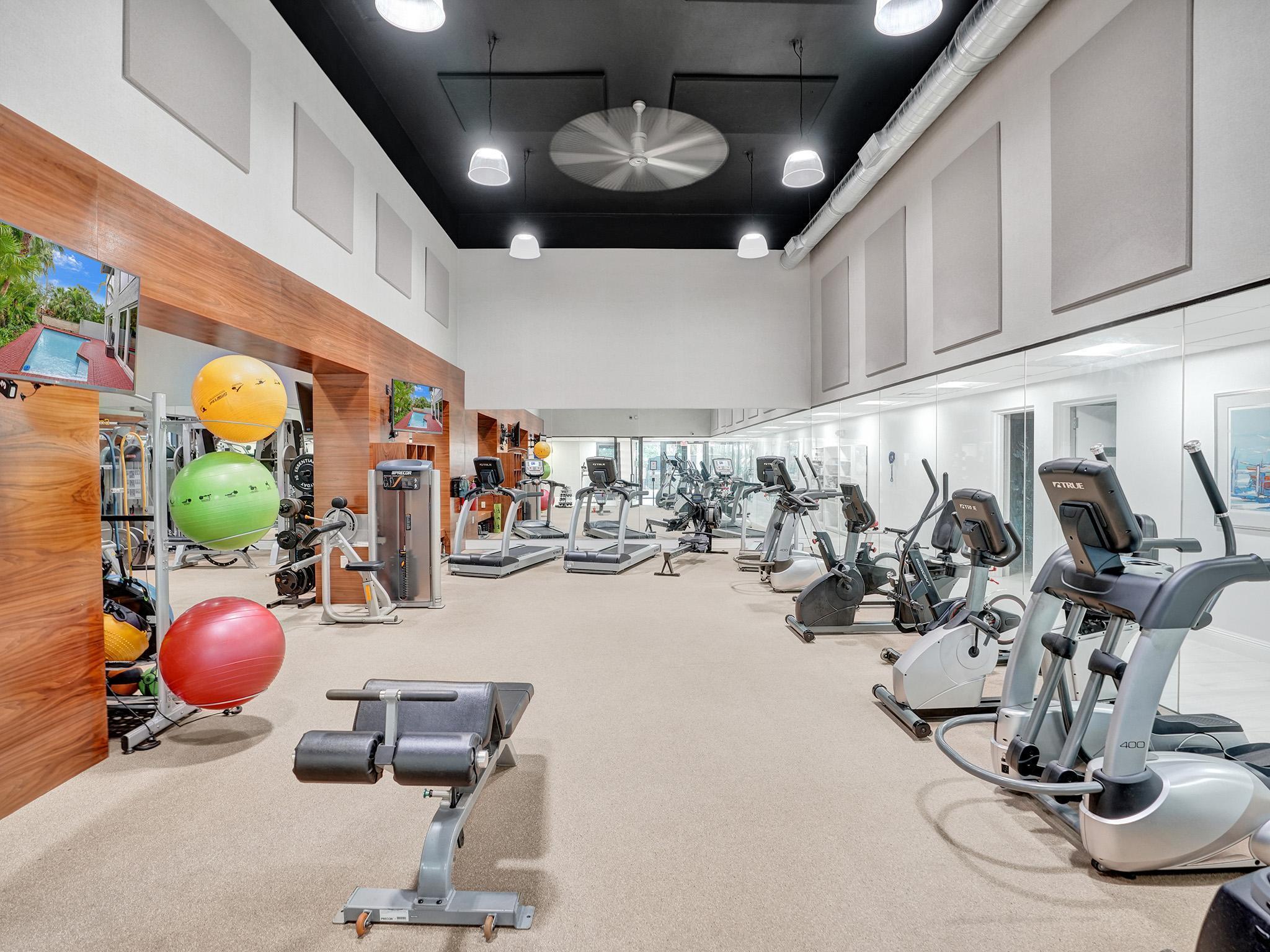 17288 Hampton Boulevard Boca Raton, FL 33496 - Photo 28 of 36 a view of a room with gym equipment
