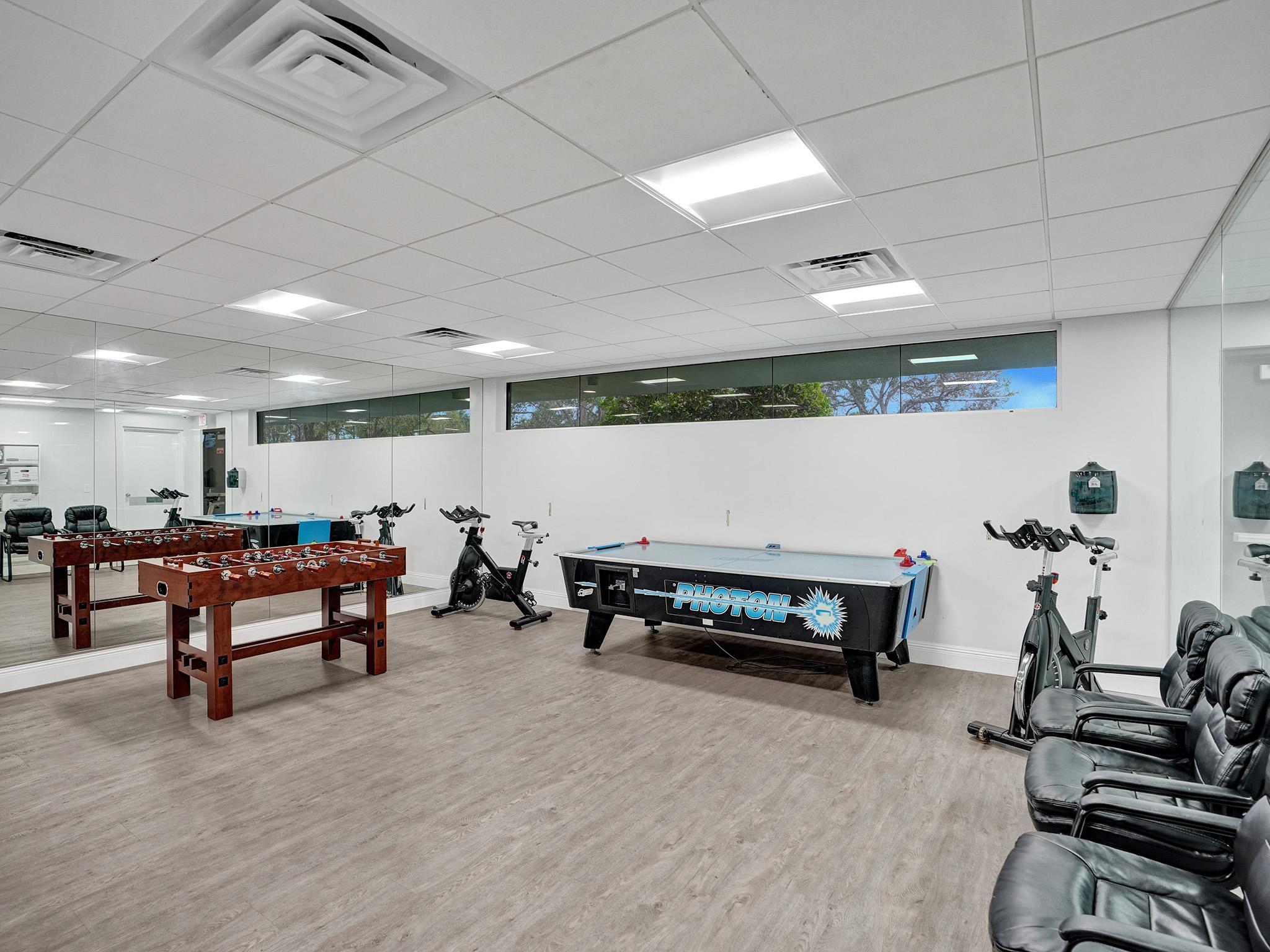 17288 Hampton Boulevard Boca Raton, FL 33496 - Photo 31 of 36 a living room with furniture and a pool table