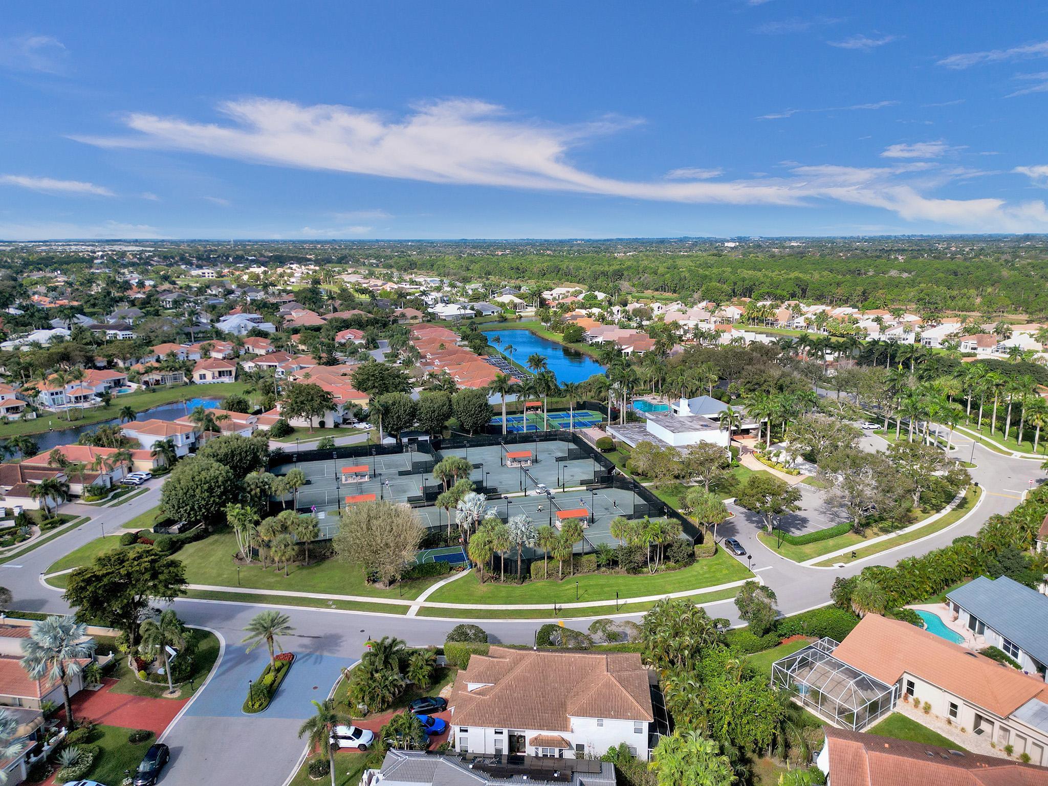 17288 Hampton Boulevard Boca Raton, FL 33496 - Photo 33 of 36 an aerial view of residential houses and outdoor space