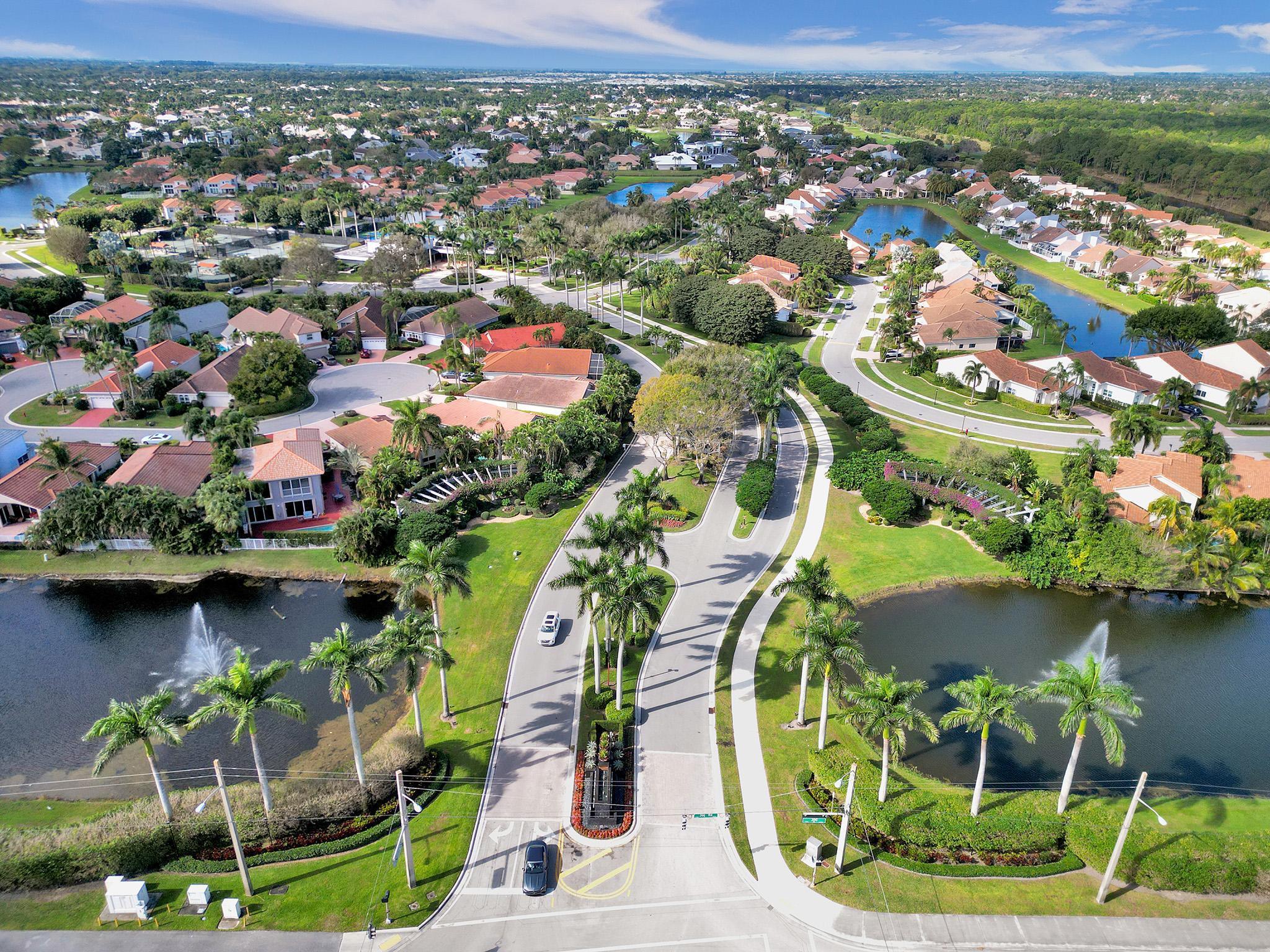 17288 Hampton Boulevard Boca Raton, FL 33496 - Photo 34 of 36 an aerial view of a residential houses with outdoor space and lake view