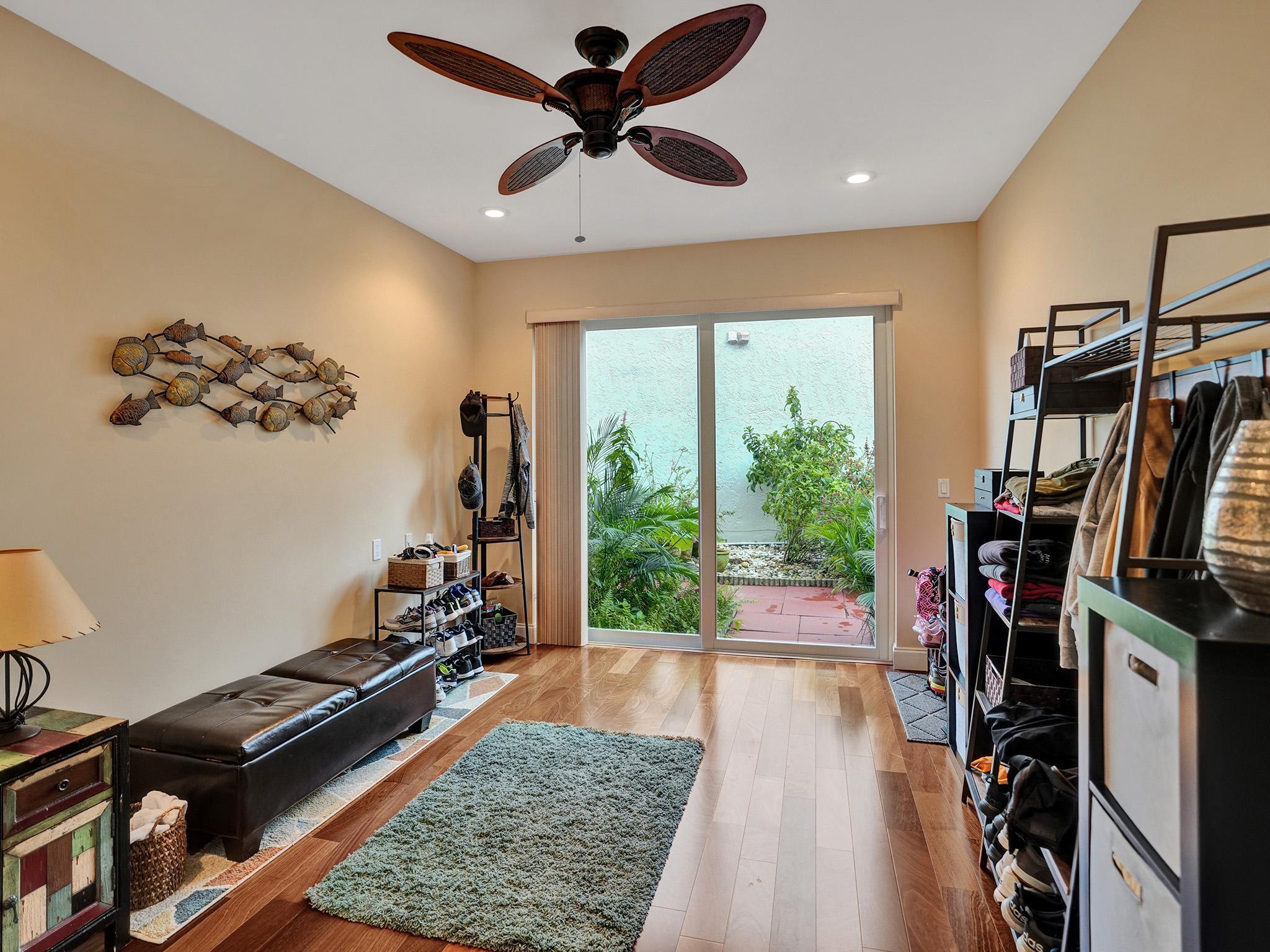 17288 Hampton Boulevard Boca Raton, FL 33496 - Photo 6 of 36 a view of a room with gym equipment