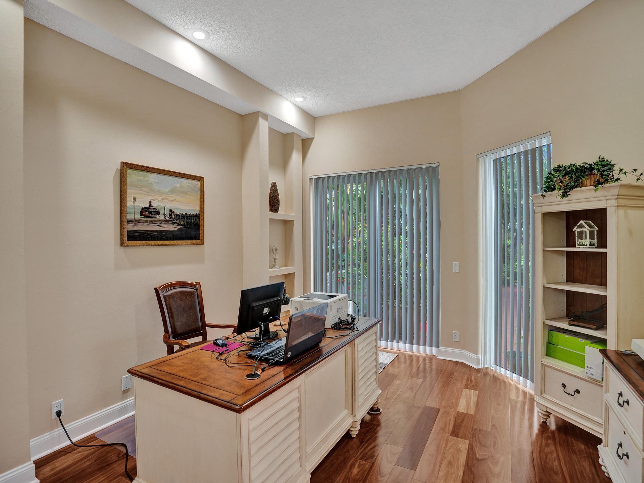 17288 Hampton Boulevard Boca Raton, FL 33496 - Photo 8 of 36 a view of a workspace with furniture and a window