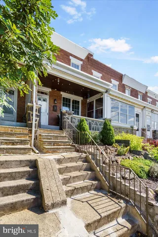 front view of a house with a patio
