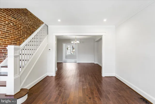 a view of livingroom with wooden floor