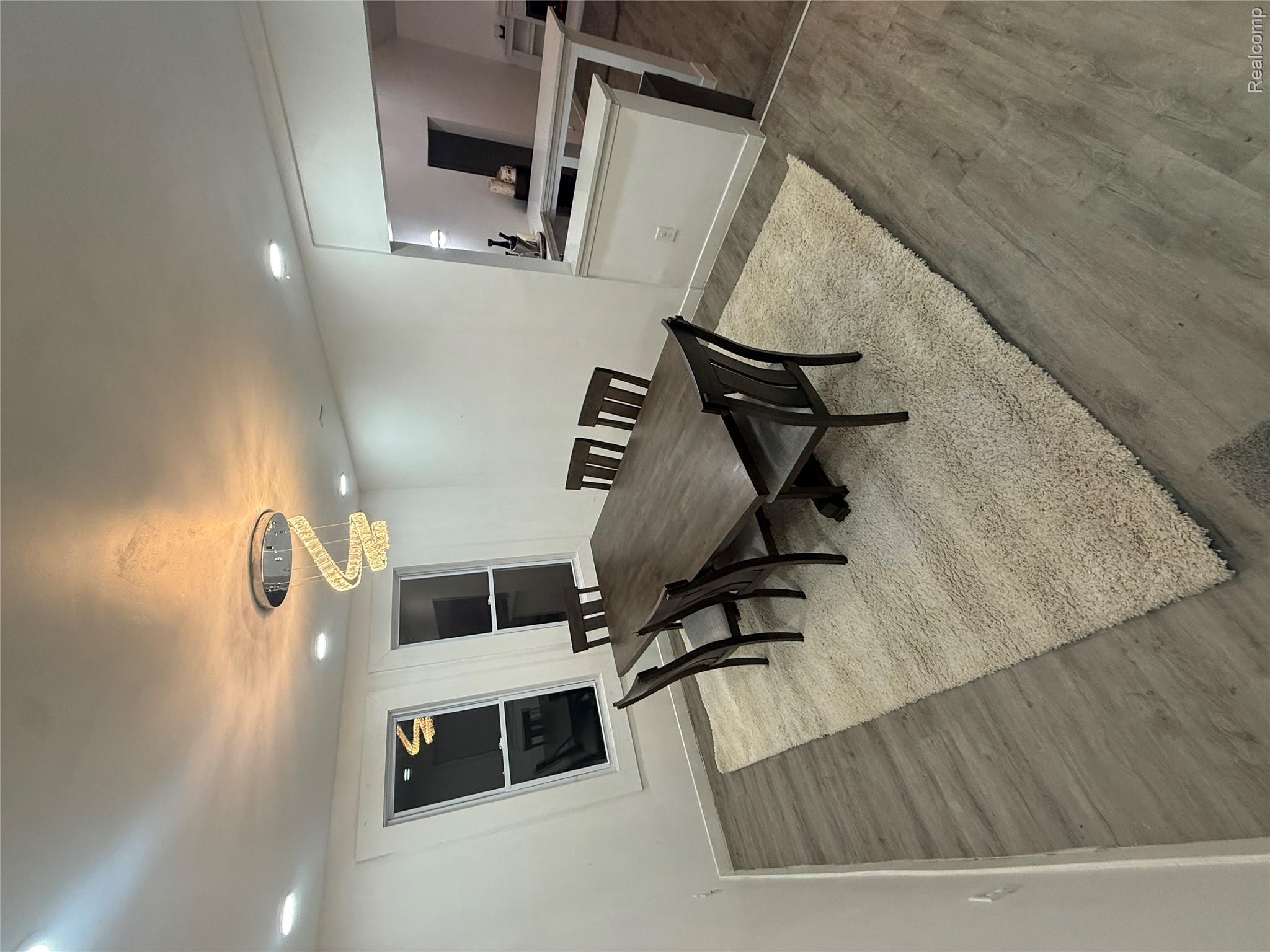44862 Willis Road Belleville, MI 48111 - Photo 14 of 14 Dining space featuring wood finished floors and baseboards